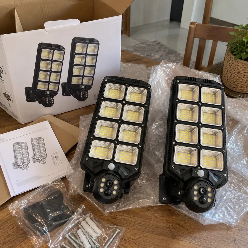 Kit GuardBeam 2x1 aperto con due unità, viti e manuale